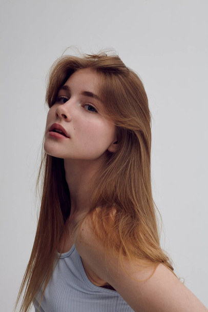 portrait of a beautiful girl with thick blond hair - Fotó, kép