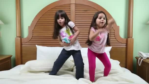 Girls dancing in the bed. - Footage, Video
