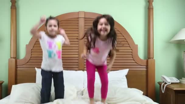 Girls jumping in the bed - Footage, Video