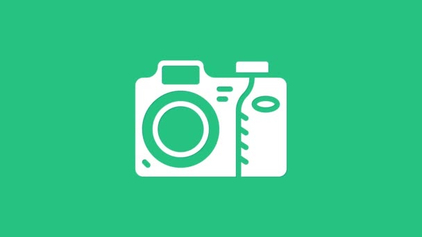 Fehér Fényképezőgép ikon elszigetelt zöld háttérrel. Fényképezőgép ikon. 4K Videó mozgás grafikus animáció - Felvétel, videó
