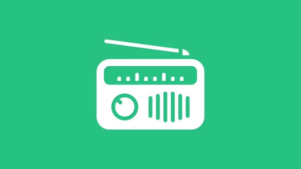 Λευκό ραδιόφωνο με εικονίδιο κεραίας που απομονώνεται σε πράσινο φόντο. 4K Γραφική κίνηση κίνησης βίντεο - Πλάνα, βίντεο
