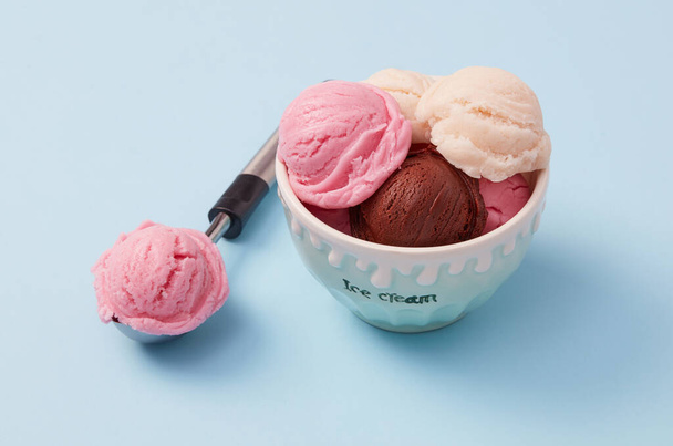 Ice cream balls on blue background - Photo, Image