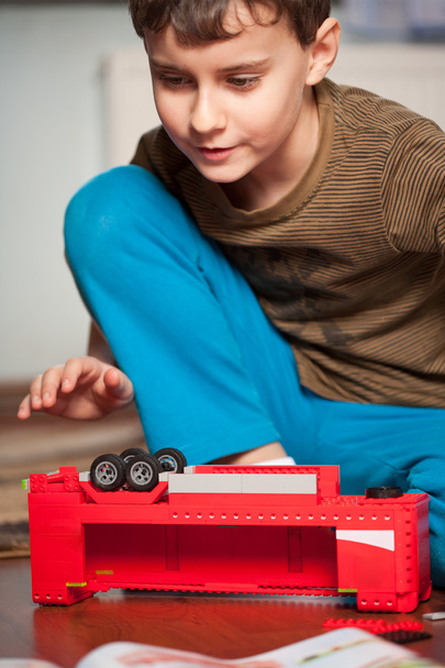 Boy playing with toys - Fotó, kép