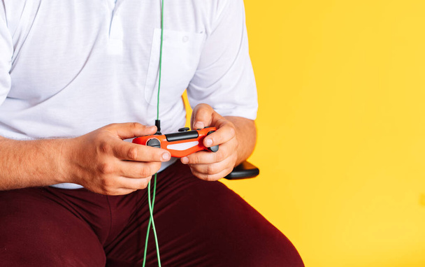 Guy holding game controller playing video games. - Photo, Image
