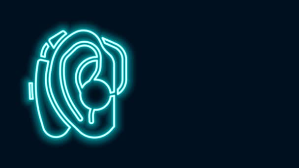 Linea neon luminosa Icona dell'apparecchio acustico isolata su sfondo nero. Udito e orecchio. Animazione grafica 4K Video motion - Filmati, video