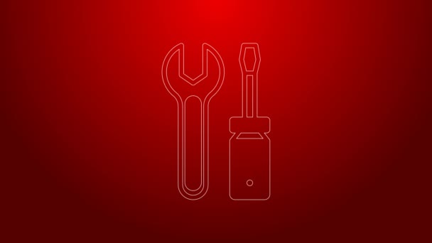 Green line Screwdriver and wrench spanner tools icon isolated on red background. Service tool symbol. 4K Video motion graphic animation - Footage, Video