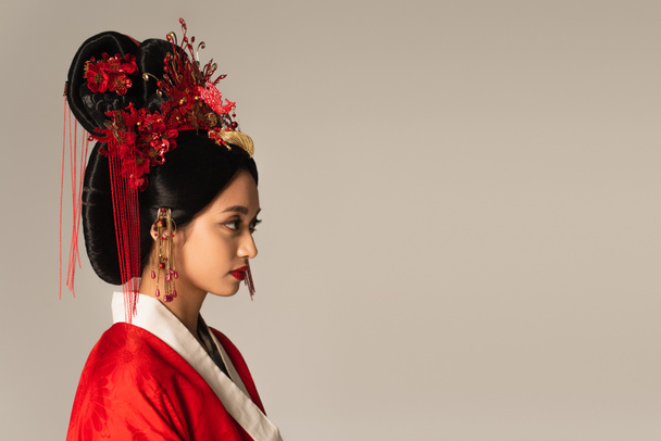 Side view of japanese woman with traditional hairdo isolated on grey  - Fotografie, Obrázek