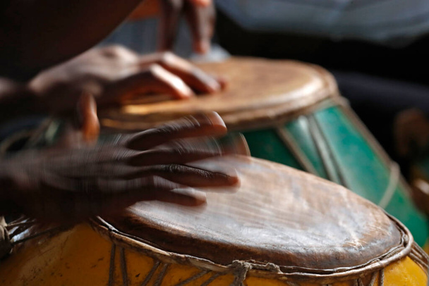 Djembe player at catholic mass.  Music.  Agbonou Koeroma. Togo.  - Photo, Image