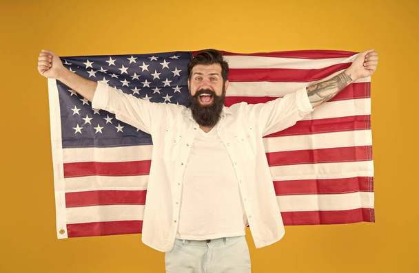 Declaration of independence. USA holiday. Gain insight into ancestral origins. National Independence. Happy bearded man celebrate Independence day. Cheerful citizen hold american flag. July 4th - Foto, immagini