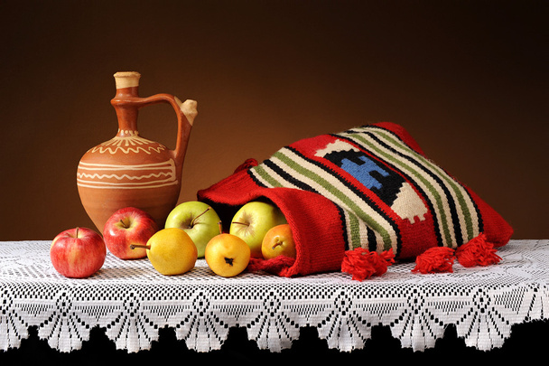 Fresh apples and pears in ethnic bag - Photo, Image