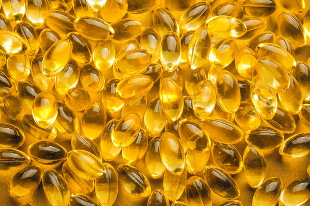 Fish oil capsules as background - Photo, Image