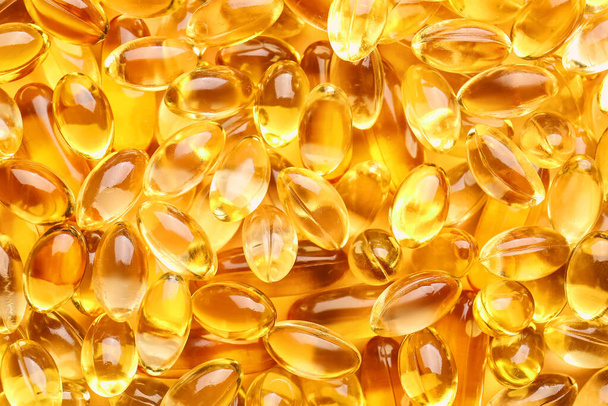 Fish oil capsules as background - Zdjęcie, obraz