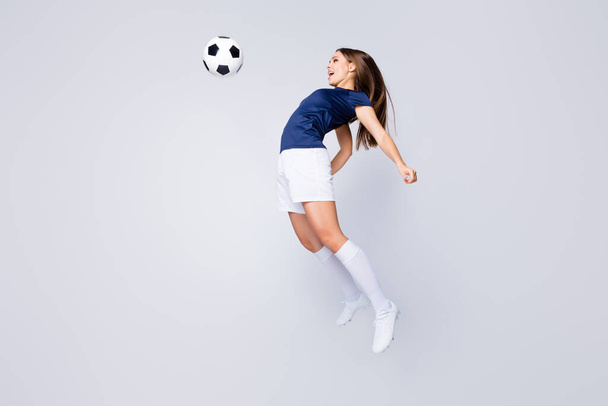 Full length body size view of her she nice attractive lovely graceful energetic sportive straight-haired girl jumping hitting throwing ball isolated on light white gray pastel color background - Φωτογραφία, εικόνα