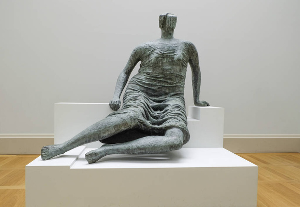 LONDON, UNITED KINGDOM - Aug 07, 2015: A cast bronze sculpture Draped Seated Woman by Henry Moore in Tate Britain. - Фото, изображение