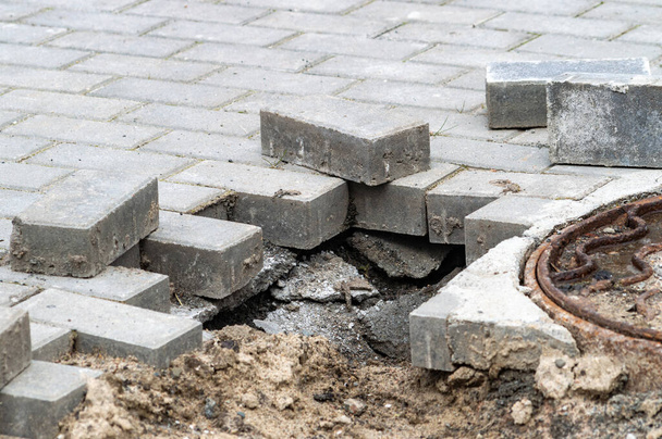 paving of the sidewalk with bricks. - Photo, Image