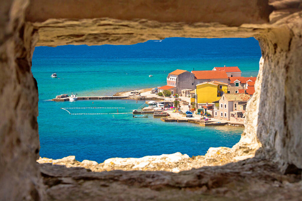 Island of Krapanj colorful waterfront view through stone window, Dalmatia archipelago of Croatia - Foto, imagen