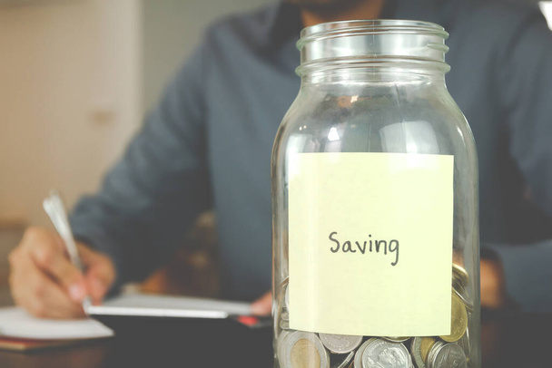 Saving money for finance accounting concept. businessman manage his accounting. - Φωτογραφία, εικόνα