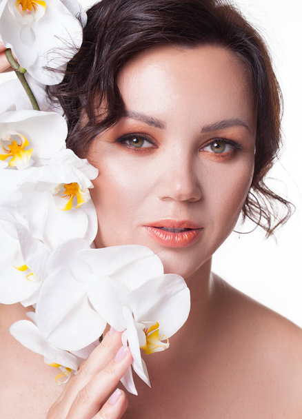 Beautiful portrait girl with flower orchid lips Fashion Beauty  - Fotoğraf, Görsel