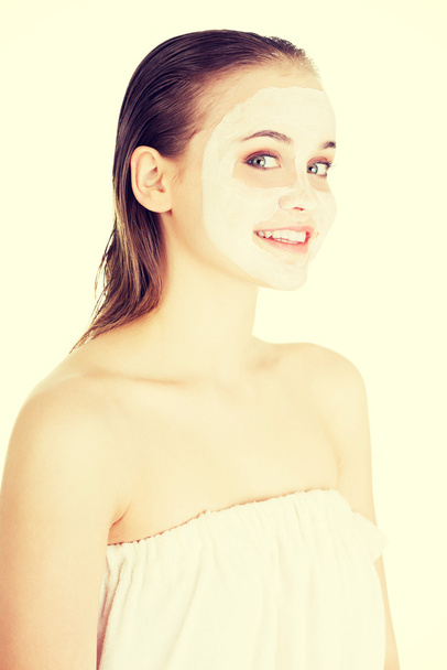 Woman with clay facial mask - Photo, Image