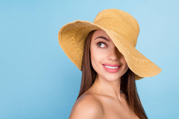 Photo of cool brown hairdo young lady wear hat isolated on blue color background - Φωτογραφία, εικόνα