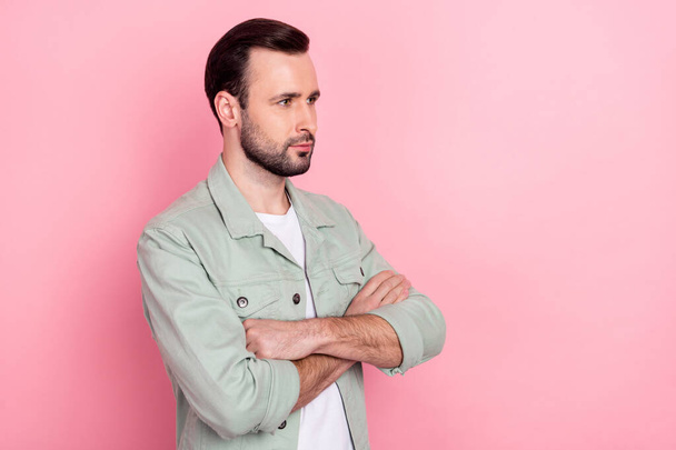 Profile side view portrait of attractive content guy folded arms copy empty space place isolated over pink pastel color background - Zdjęcie, obraz