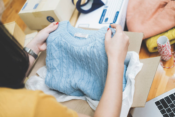 Online small business owner. Young startup entrepreneur online small business owner working at home, packaging and delivery situation.  - Foto, Imagem