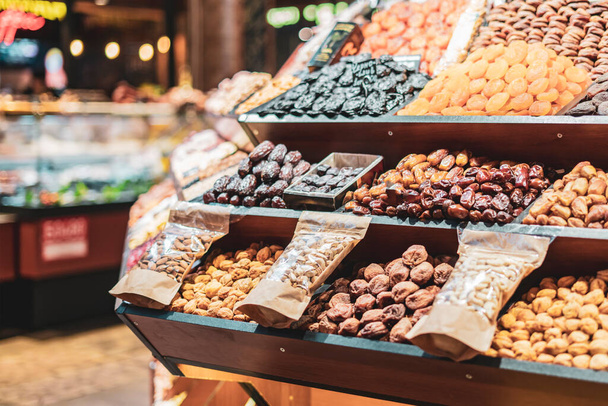 assortment of organic dried fruits in the market b - Фото, изображение