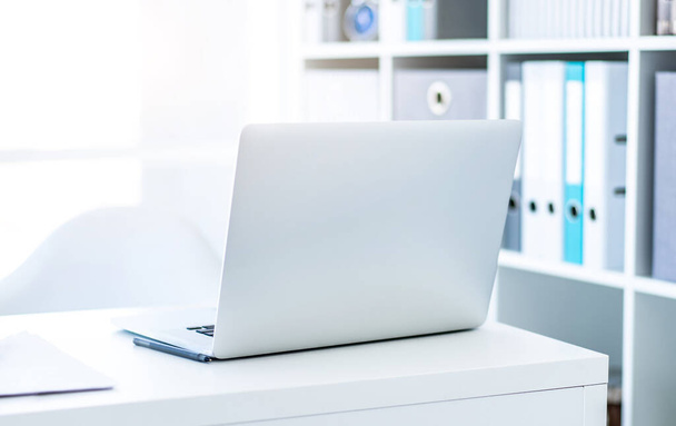 Modern laptop on white table - Фото, зображення