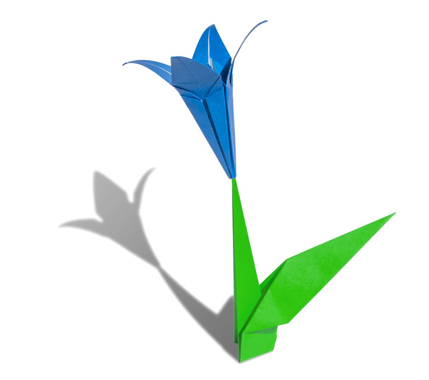 blauwe origami bloem lily geïsoleerd op wit - Foto, afbeelding