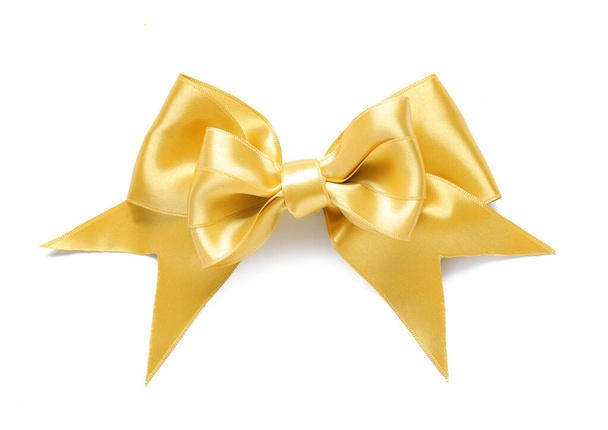 Beautiful golden bow on white background - Fotó, kép