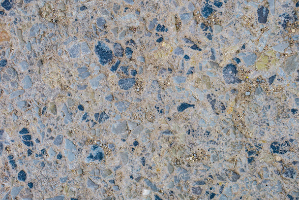 Texture of old asphalt with chunky stones - Photo, Image