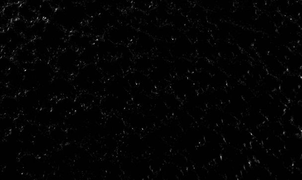 Hintergrund der Staubstruktur auf schwarzer und dunkler Oberfläche, Nahaufnahme - Foto, Bild