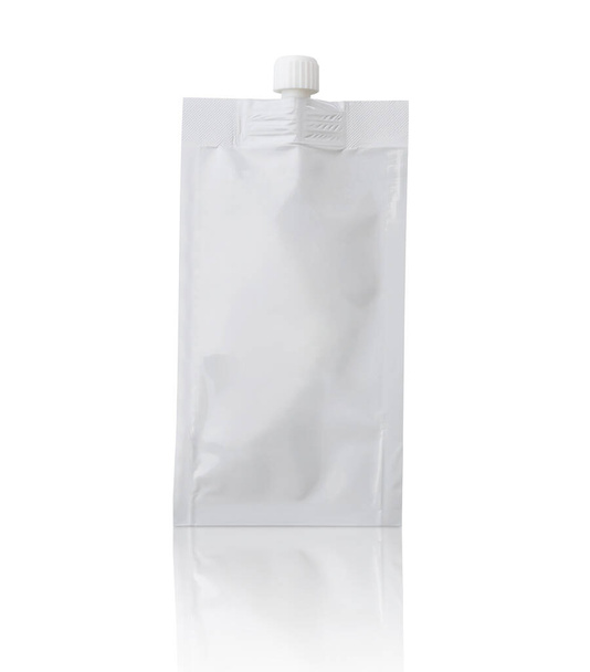 Blank white cosmetic cream sachet with plastic cap isolated on white background - Photo, Image