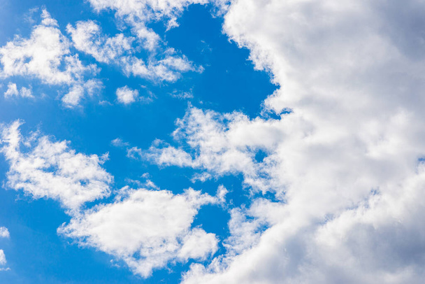 Beautiful blue sky,white cloud background. Shape independent, Elements of nature.Wonderful sky. Beautiful white fluffy clouds on a light blue sky background. - 写真・画像