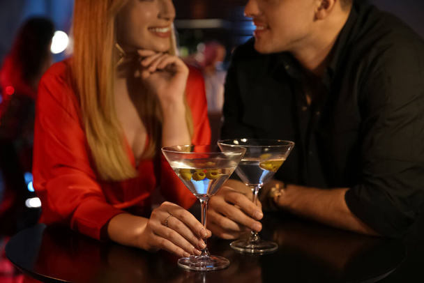 Man and woman flirting with each other in bar, closeup - Фото, зображення