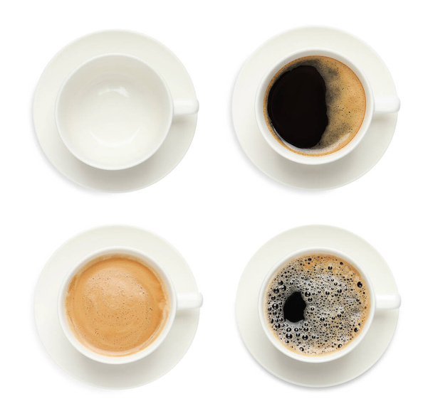 Set with cups of hot aromatic coffee on white background, top view  - Foto, imagen