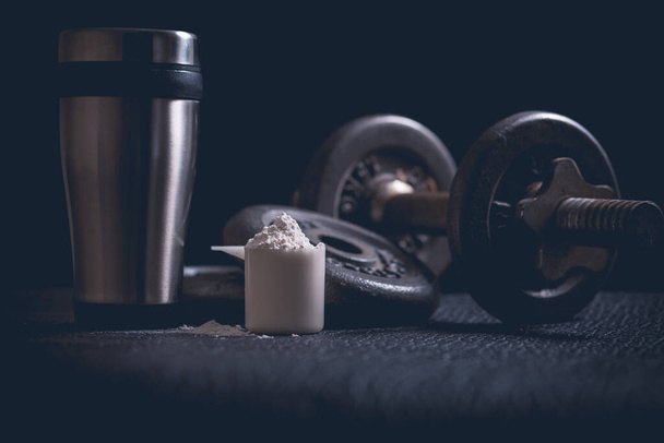 Τροφοδότης πρωτεϊνών ορού γάλακτος και αλτήρες - Φωτογραφία, εικόνα