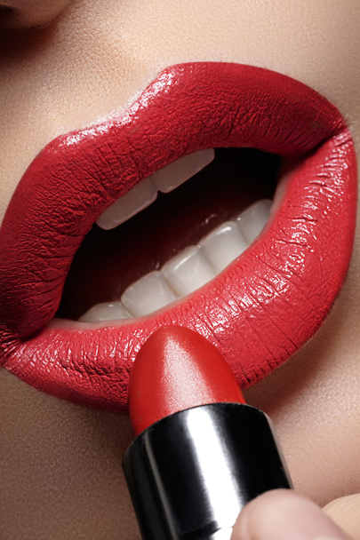 Beautiful female with shiny lips close-up - Фото, изображение