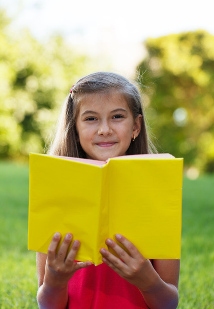 Little genius  with yellow book - Fotoğraf, Görsel