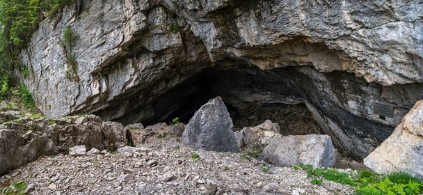 The mighty rock halls of the Schneckenloch karst cave near Schoenenbach in Vorarlberg, Austria - Zdjęcie, obraz