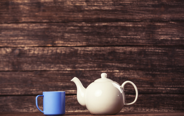 czajniczek i filiżanka herbaty - Zdjęcie, obraz