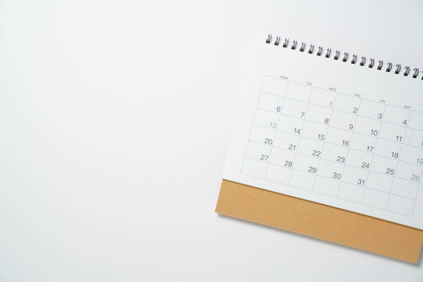 close up of calendar on the white table background, planning for business meeting or travel planning concept - Photo, Image