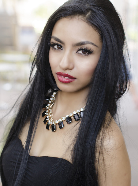 Beautiful young woman wearing black dress - Fotografie, Obrázek