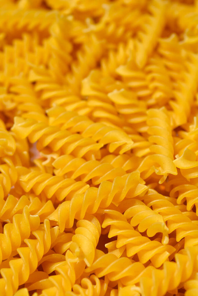 Close up of dry uncooked fusilli - Photo, image