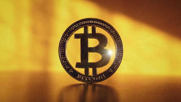 Bitcoin business. Gold Crypto currency BTC Bitcoin on black background. Golden Bit Coin virtual cryptocurrency or blockchain technology. Virtual money and mining concept - Photo, Image