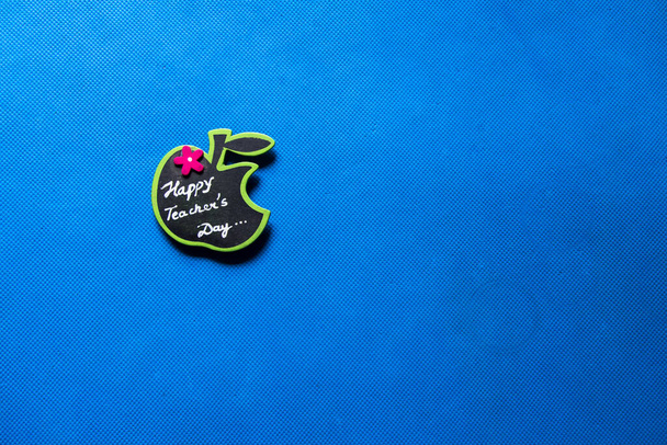 Happy teachers day badge isolated on the background with the use of selective focus - Fotografie, Obrázek