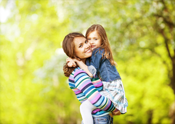 Mother and daughter enjoy the early spring. Mother day. - Foto, imagen