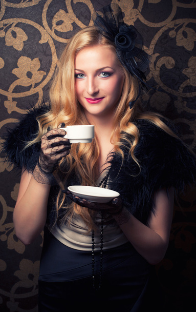 Woman drinking coffee - Foto, Bild