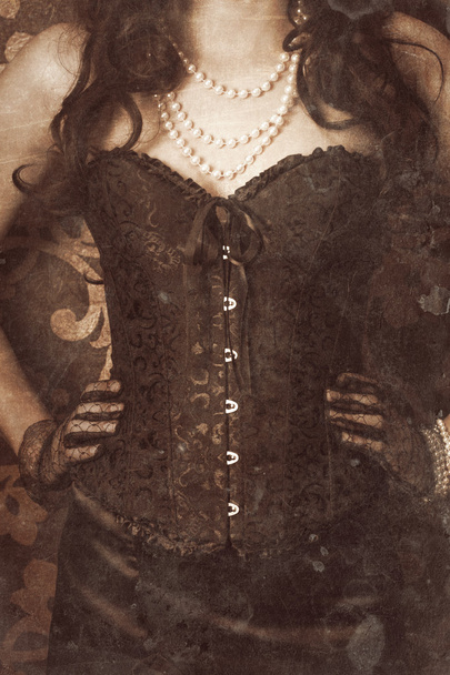 nő visel fűző - Fotó, kép