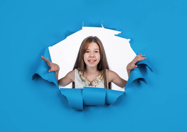 happy teen girl on blue background, happiness - Photo, Image